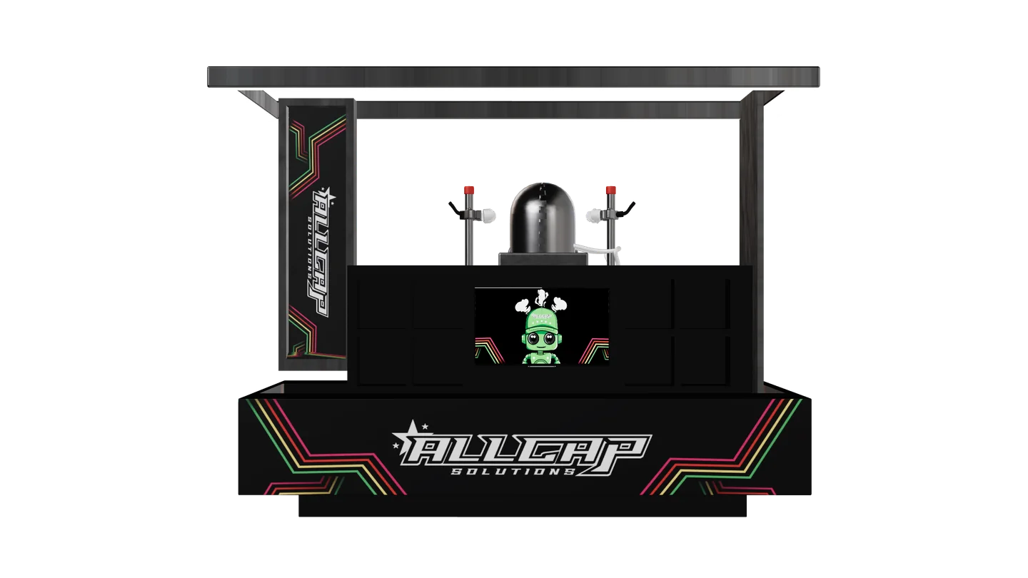 A hat-cleaning booth for ALLCAP Solutions: a branded service counter under a lit steel canopy, with the cleaning unit on the worktop and a screen showing the company's robot mascot, assembled at the end of a build that puts it together part by part.